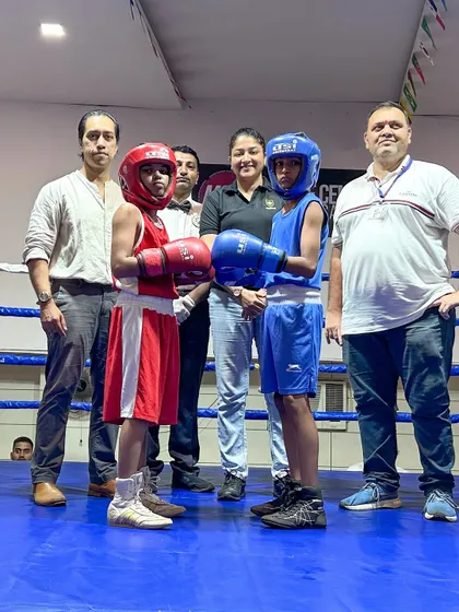 The face-off before a bout at the NMMC DSO Tournament. You can see the focus and determination in the eyes of these young fighters. The ring is set, and they are ready.