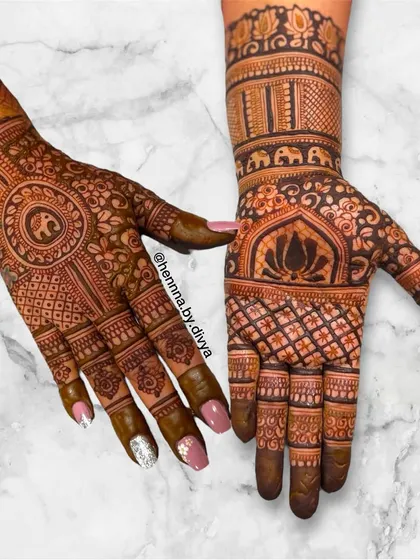 A beautiful asymmetrical design combining an elephant mandala on one hand with a lotus and grid pattern on the other. The contrast creates a modern and artistic look.