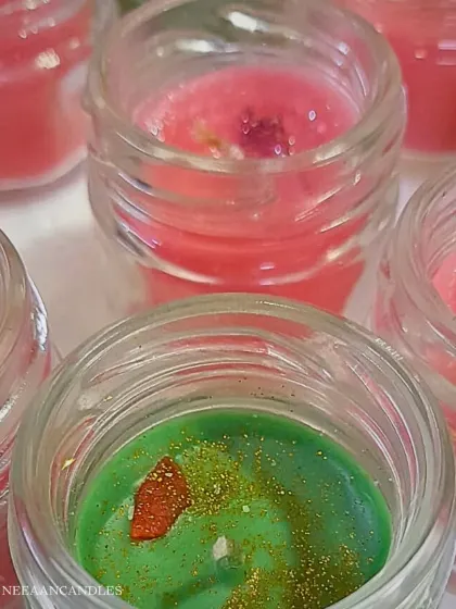 Bright, colorful, and handmade with love. These festive jar candles are filled with crystals and glitter to bring warmth and a touch of sparkle to your home.