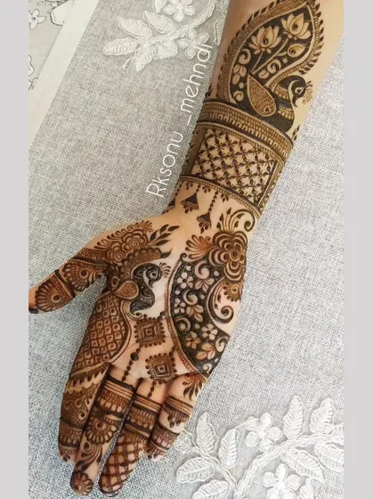 This gallery showcases a variety of my traditional designs. You'll find classic elements like peacocks, elephants, lotuses, and intricate jaali (net) patterns, all expertly crafted to create timeless beauty.