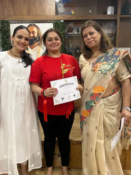 Celebrating our winning women's team, "Yogini," at a studio event. We love to recognize the hard work and dedication of our members.
