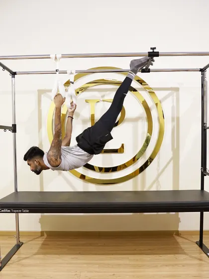 Pilates is about control, not just brute force. Here, we're using the Cadillac Trapeze Table to build deep core strength and total body awareness. This is what finding that balance between strength and grace looks like.