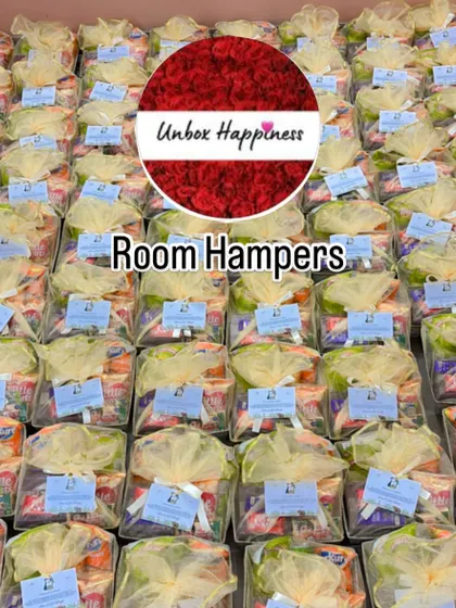 Rows of identical room hampers, showing my attention to detail and consistency for large event orders.