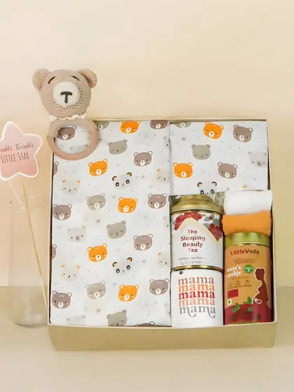 A gift box for a new mom and baby, including tea for the mother and a rattle for the baby. This shows my ability to photograph hampers with a dual purpose.