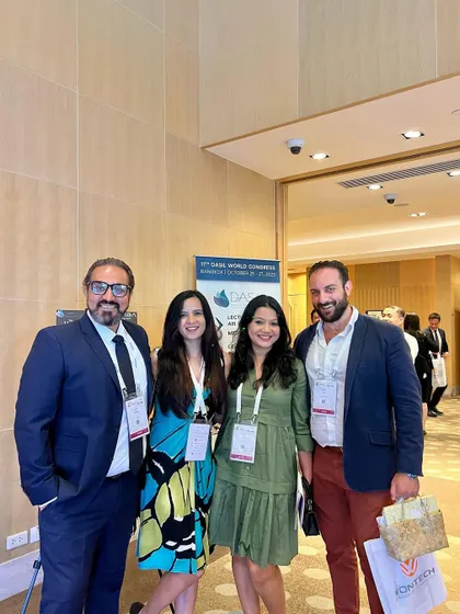With friends and colleagues in the halls of the DASIL World Congress in Bangkok.