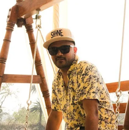 A relaxed shot on a swing at an outdoor event. It's not always high energy; sometimes it's about enjoying the calm before the storm.