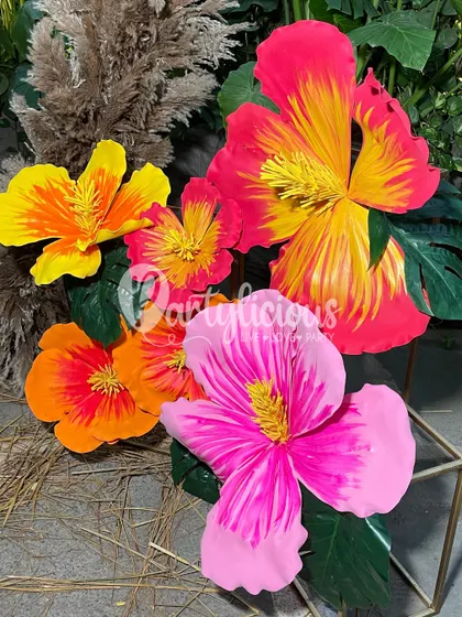 These vibrant, oversized hibiscus flowers were handcrafted for a tribal-themed event. The bold colors and natural textures helped create an immersive atmosphere that was both earthy and full of energy.