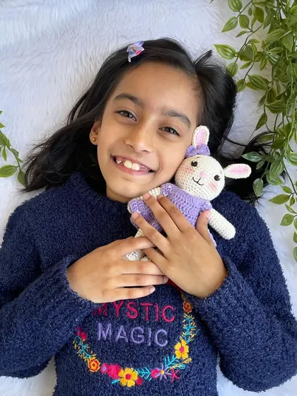 A lovely bunny in a purple dress with a custom initial "Q" on it. I made a similar one for my own daughter's birthday, and she absolutely adores it!