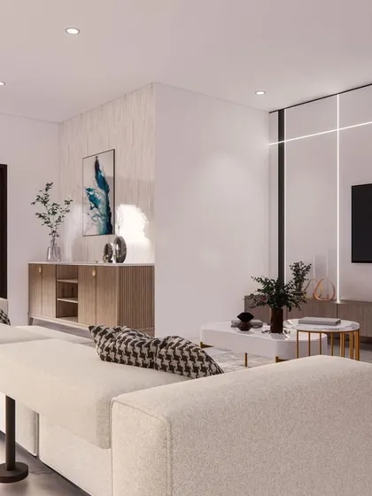 The 'Eleganza' living room, where a clean, modern TV unit with integrated lighting is balanced by a warm wood finish.
