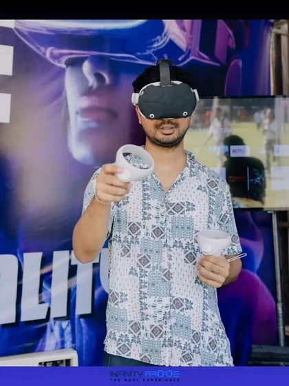 Point and play. A guest gets the hang of our intuitive VR controllers as he starts his virtual adventure.