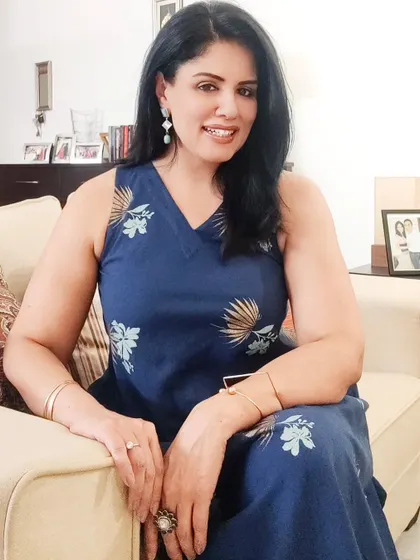 For a special evening out, I wore this long, comfy cotton dress in a beautiful shade of blue with gold and teal floral prints. I chose gold earrings to complement the gold hues in the dress.