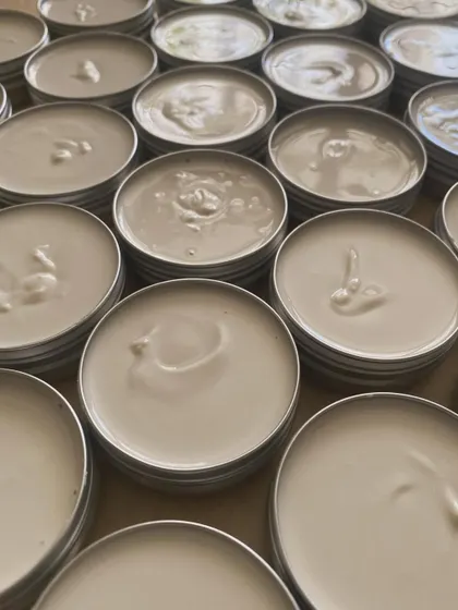 Freshly poured deodorant creams, ready to set. We use a blend of grapeseed oil, mango butter, and candelilla wax to nourish and protect your underarms.