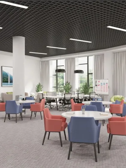 This is a 3D render of a dynamic co-working and breakout area. The open-plan layout encourages collaboration with flexible seating options, including small group tables and casual lounge chairs, all set within a bright, airy space with large windows.