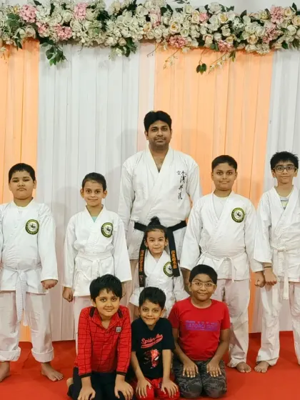A mix of beginner and junior students from our Rejoice International School program, all proud of their progress.