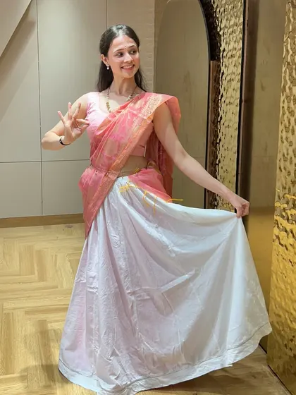 A still from my 'Inkem Inkem' performance, showcasing the traditional South Indian inspired attire I designed for the piece. The costume is an essential part of the storytelling.
