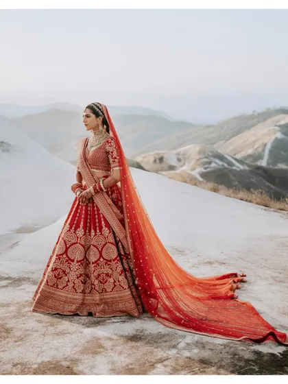 A bridal portrait that feels as grand as the moment itself. I use dramatic landscapes, like these stunning mountains, to frame the bride not just as a subject, but as the hero of her own epic story.
