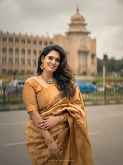 A stunning solo portrait of the bride-to-be, her elegance complementing the grandeur of the location.