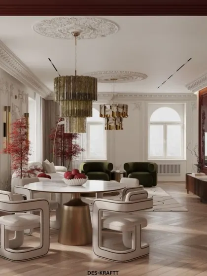 This angle reveals the grand scale of the neoclassical room, with its high ceilings, ornate moldings, and a curated selection of modern and artistic furniture.