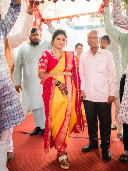 Another angle of the bridal entry, showing how the Nauvari is draped to allow for easy and confident walking.