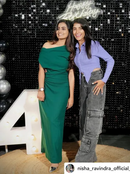 Fun and candid moments from a 24th birthday party, showcasing the modern shimmer wall and marquee number decor.