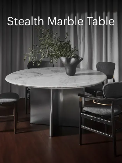 The Stealth Dining Table, with its striking marble top and sculptural metal base, is a testament to our commitment to quality and craftsmanship. It’s a centerpiece designed to impress and endure.