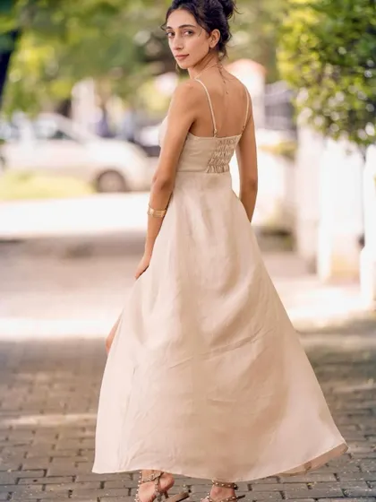 A final look from this serene outdoor photoshoot. The back detail of the dress is so pretty.