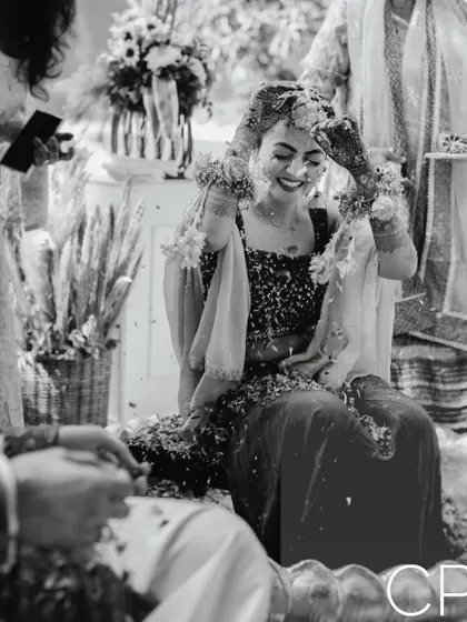A joyful black and white candid from the Haldi ceremony, proving that emotion is powerful even without color.