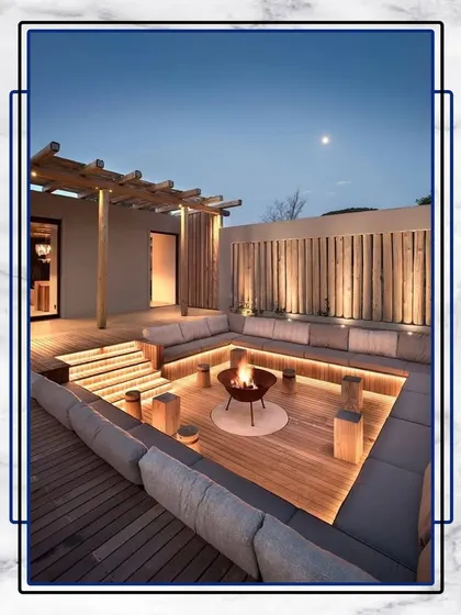 This design concept for a sunken outdoor lounge with a fire pit is the epitome of luxury entertaining. It's the perfect space for creating memories under the stars.