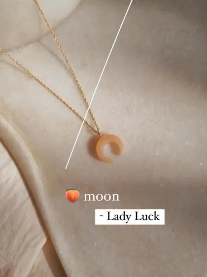 A choice between two beautiful moons: the Pink Opal moon for new love, and the Peach Moonstone crescent for inspiration and new beginnings.