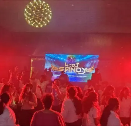 My branding on the big screen while the corporate crowd dances.