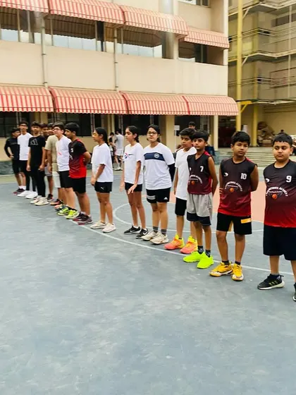 The team lines up after a match, a moment to reflect on the game and show respect for the opponent.