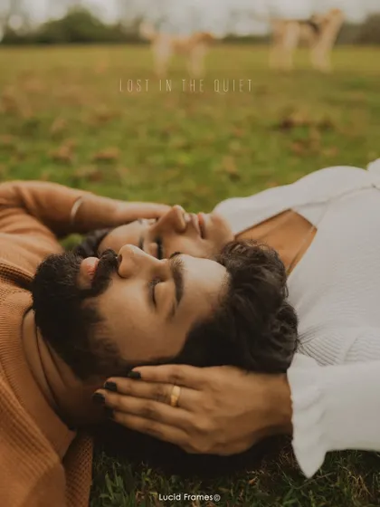 "Lost in the quiet." A serene moment of the couple resting together, with a furry friend watching over them.