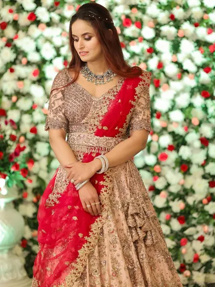 A beautiful portrait of this client, who is also a dear friend. Her reception look is soft and romantic, with a half-up hairstyle and an elegant lehenga.