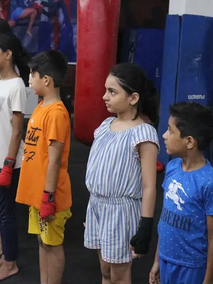 A lineup of our young students, ready for their summer camp class. We give children the gift of fitness and self-defense.