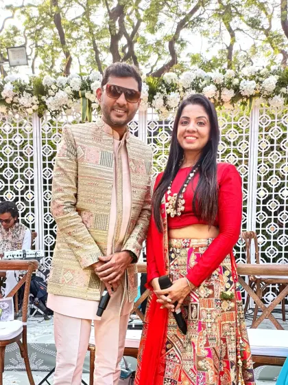 With one of the talented singers from my team. We work closely to curate the perfect playlist of traditional and modern songs for the wedding ceremony.