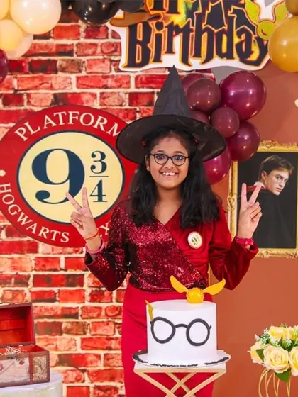 A charming 'Baby Boss' themed birthday party, with a sophisticated black and white color scheme, custom props, and a stylish backdrop, perfect for a little executive.