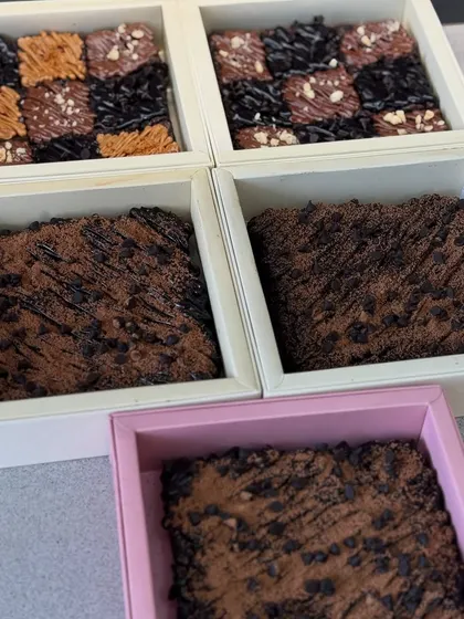 Assorted brownie boxes ready for Rakhi. We offer different combinations to suit everyone's taste.
