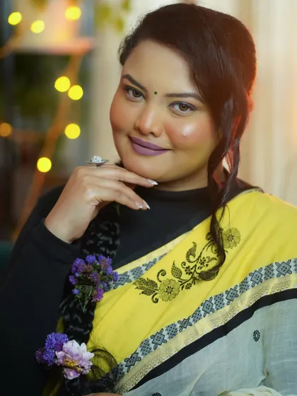 This pose highlights the finished makeup, from the well-defined brows to the smooth base. Learning these details is what gives you the confidence to do your own makeup.