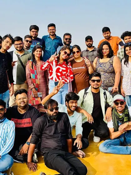 A group photo on the rooftop of Jaisalmer fort, overlooking the golden city. We take you to the best vantage points for incredible views.