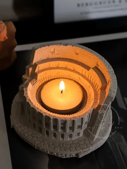 My Colosseum sculpture, shown here as a tealight holder. The candlelight glows from within the ancient arena, creating a dramatic and beautiful effect.