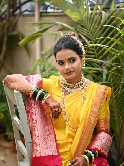 The complete royal Marathi bride look. The posture, the drape, and the confident expression all come together perfectly.