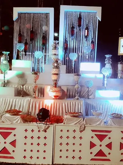 A beautifully lit salad counter with a cascading backdrop. We focus on presentation to make every part of the meal, including healthy salads, feel special and tempting.