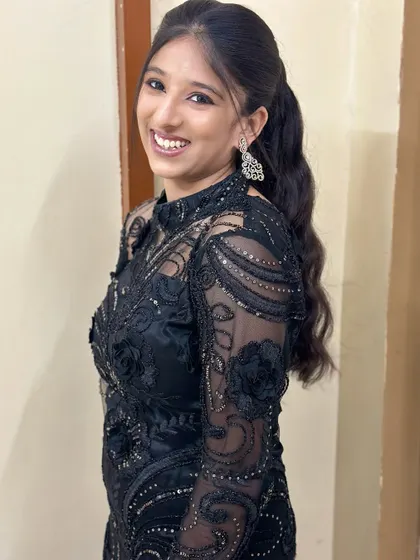 A happy, smiling shot of the retro waves look.