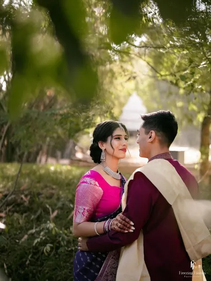 The couple sharing a quiet moment of connection amidst the greenery of their wedding venue.