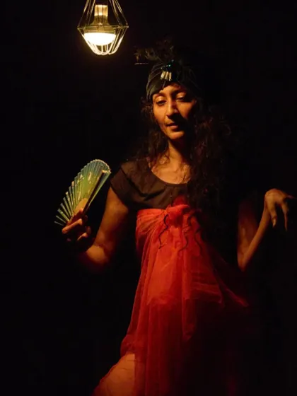 A close-up of the previous moment, highlighting the character's expression. Solo performance is about conveying a world of emotion through subtle gestures and looks.