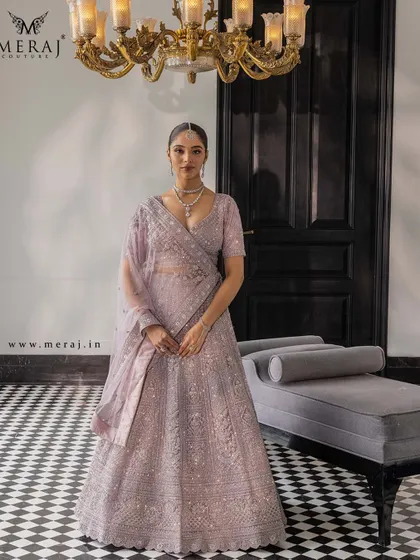 A full view of the lilac lehenga, showcasing its dreamy canvas of craftsmanship for the bride who believes in understated luxury.