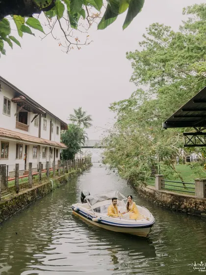The couple makes a unique and picturesque entry, arriving at their Haldi ceremony on a speedboat through a narrow canal.