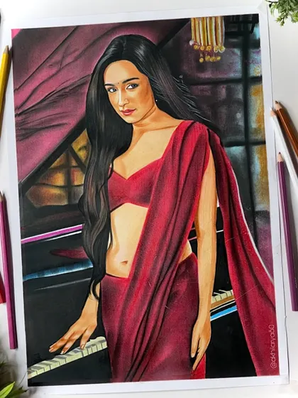 A colored pencil drawing of my favorite actress, Shraddha Kapoor. I tried to capture her elegance in this portrait, focusing on the deep red of her saree and the mood of the scene.
