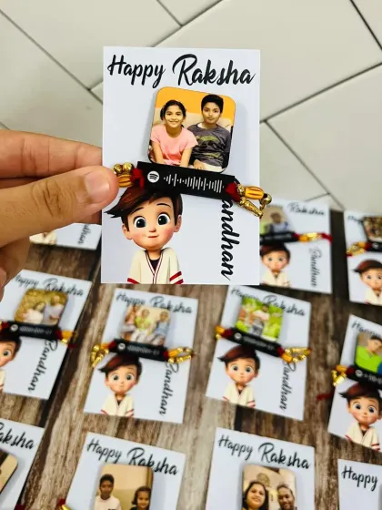 These modern rakhis feature a Spotify code that plays a special song, along with a custom photo and cartoon character.