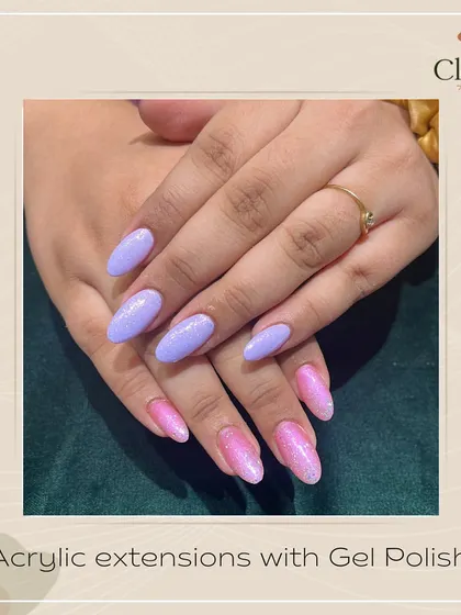 Lavender and pink are a perfect match. These acrylic extensions showcase a trendy dual-color look with a touch of sparkle.
